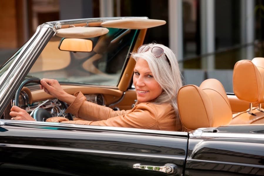 Woman in convertible